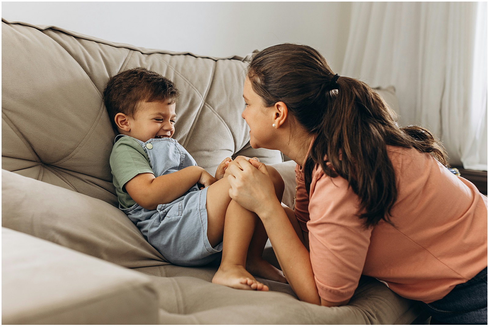 A mom with her toddler during speech therapy